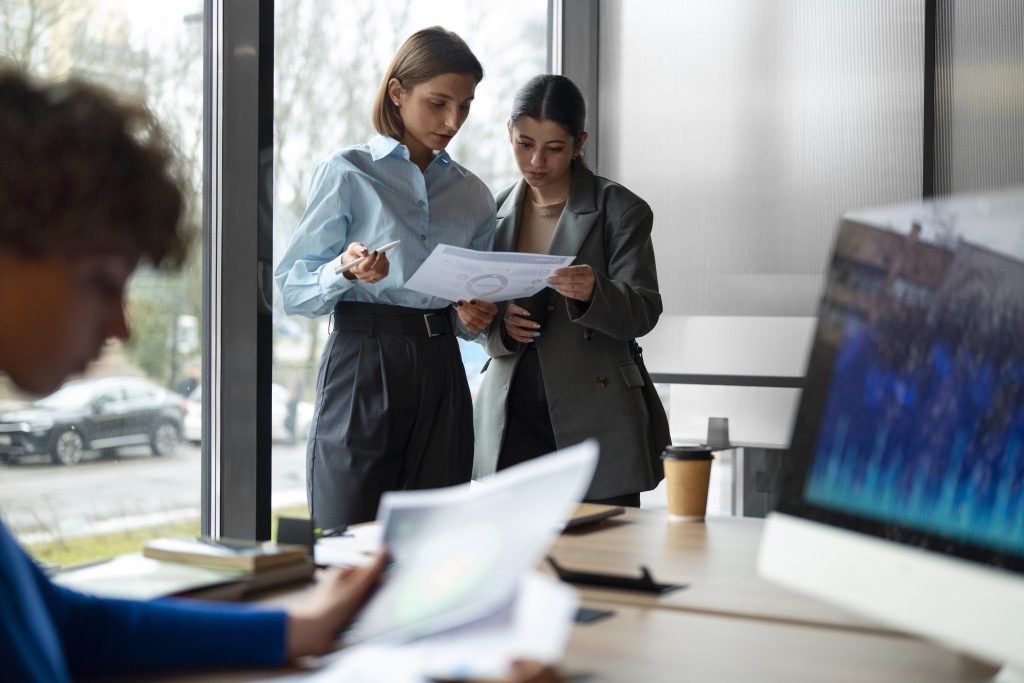 people-office-analyzing-checking-finance-graphs